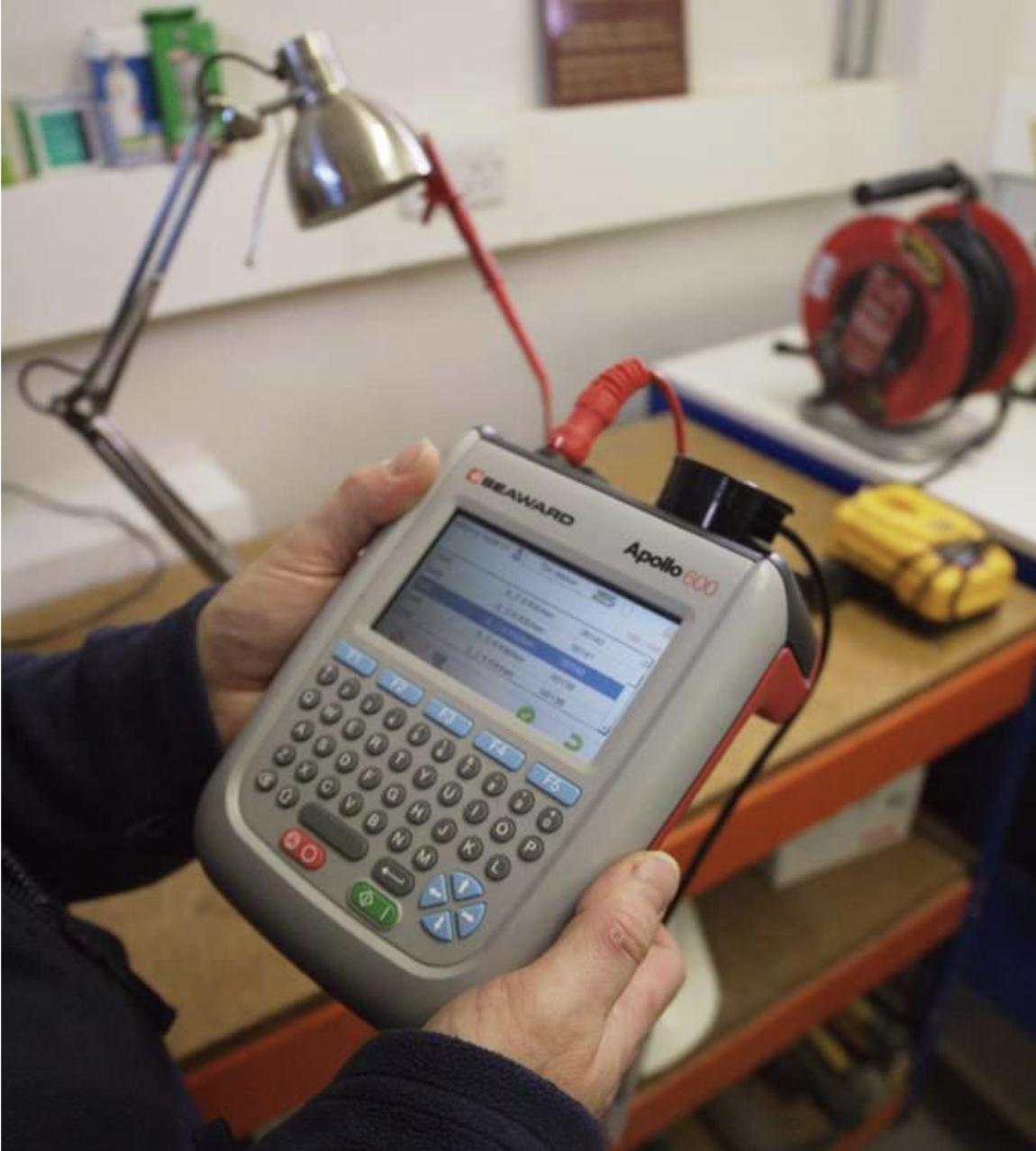 PAT Technician Testing Appliance